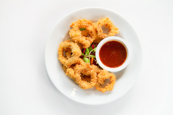 Fried,Crispy,Squid,Rings,Breaded,(,Caramari,),With,Red